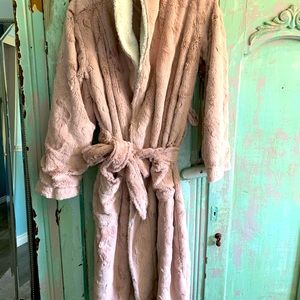 Light pink and white fluffy robe